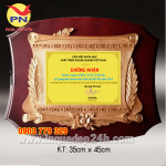 Cơ sở sản xuất kỷ niệm chương gỗ đồng, biểu trưng gỗ đồng, biển chức danh gỗ đồng